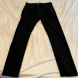 A pair of Old Navy slim fit black jeans. Size 30x32. Like new condition!